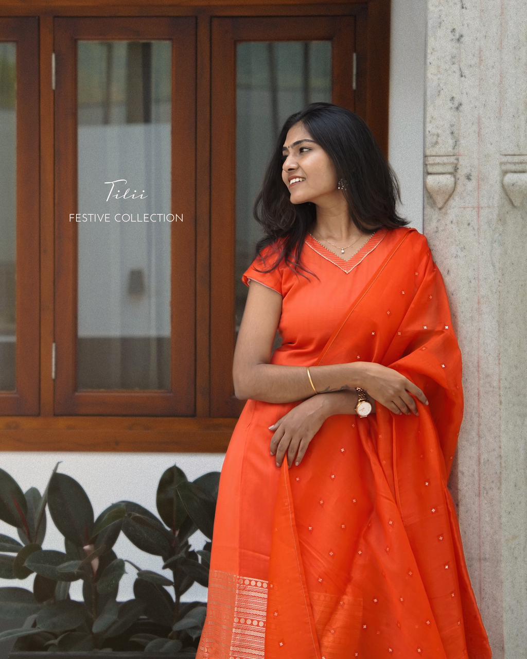 Unstitched suit set in rich burnt orange