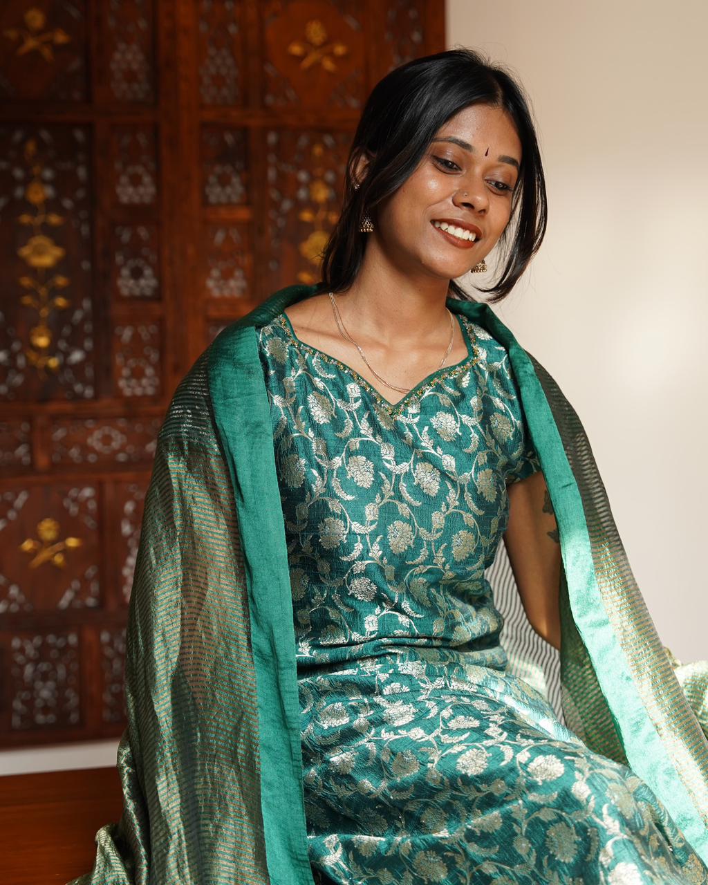 Unstitched suit set in emerald green