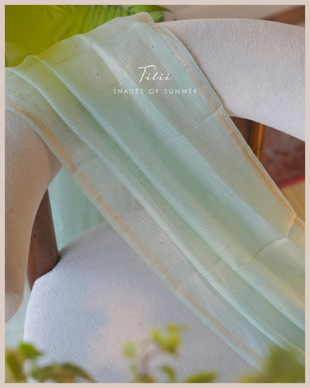 Unstitched suit set in a whisper of mint green